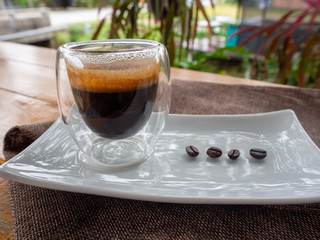 Cup of espresso on the table