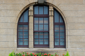 Fototapeta na wymiar Beautiful Arched Colonial Window of Taipei Post Office, Taiwan