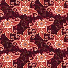 Seamless ethnic pattern with fire paisley and flowers on dark lace background. Russian, indian, damask motifs.