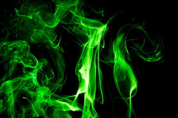 Green smoke on black background