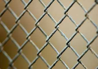 Fototapeta premium Wire fence closeup background