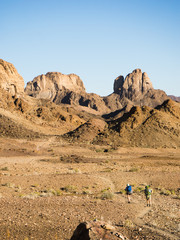 Hikers in the desert above the Fish River Canyon of Namibia - 286667038