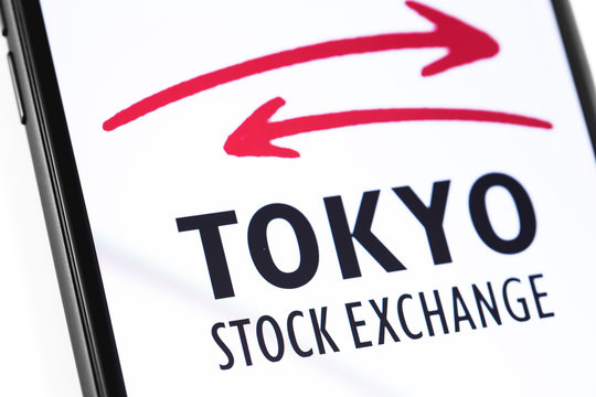 closeup smartphone with Tokyo stock exchange logo on the screen. Moscow, Russia - March 17, 2019