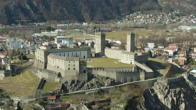 Castelgrande Castle. Bellinzona, Ticino, Switzerland. Aerial View. Swiss Alps Drone is Orbiting Medium Shot