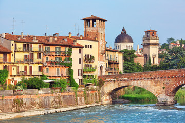 Beautiful cityscape of Verona with Pietra bridge and San Giorgio in Braida catholic church