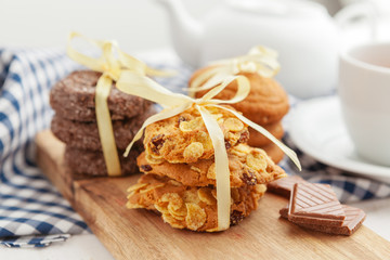 Stack of crunchy tasty cookies on a kitchen table close up