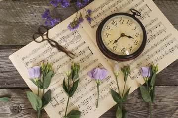 Vintage clock and roses