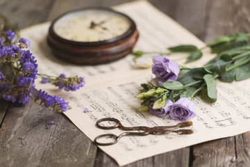 Vintage clock and roses