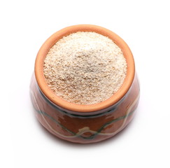 Integral rye wheat flour in clay pot, bowl isolated on white background