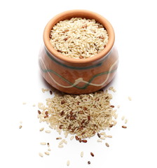 Integral rice in clay pot isolated on white background