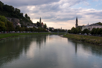 Fototapeta premium Diferents views of Salzburg skyline with Festung Hohensalzburg and Salzach river in summer, Salzburg, Salzburger Land, Austria