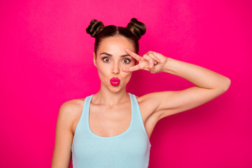 Close up photo of pretty teen making v-signs faces wearing blue singlet isolated over fuchsia background - obrazy, fototapety, plakaty