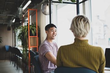 Friends having coffee together in a cafe