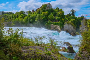 Naklejka na ściany i meble At the Rhine Falls in Switzerland. - There are much bigger waterfalls, but this 