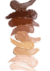 Deckende cremige Kosmetik, Foundation, in dunklem Braun, in braun mit rotem Unterton, in Rotbraun, in dunklem Beige mit rotem Unterton, in Beige, in Beige mit gelbem Unterton, in hellem Braun