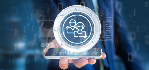 Businessman holding a social media network contact icon