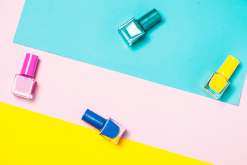 Nail polish bottles pattern background. Close up.