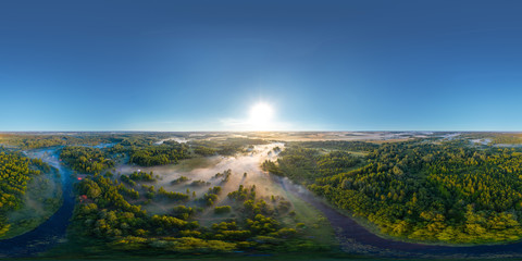 360-degree panoramic aerial view of the field, forest and river covered with a thick layer of morning fog - 286682403
