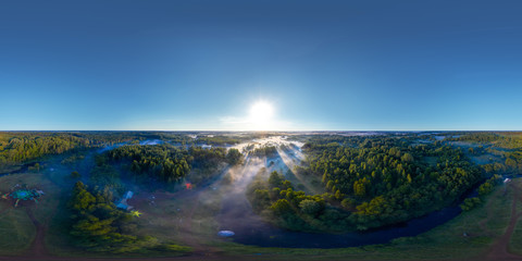 360-degree panoramic aerial view of the field, forest and river covered with a thick layer of...