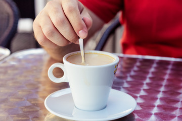 Closeup image of a businessman`s hands with coffee