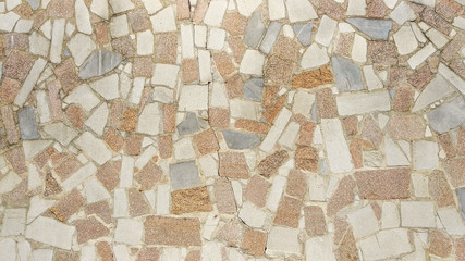 Texture of a stone wall of a castle piled from stones background