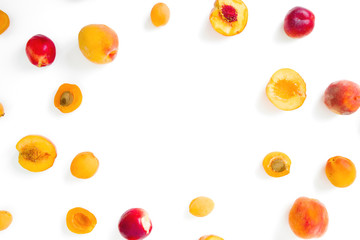 Ripe peaches with apricotes isolated on white background. Food frame. Top view. Flat lay