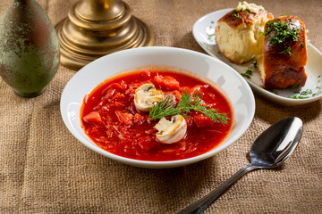 Red russian soup with mushrooms and bread