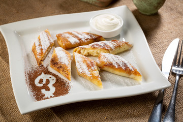 Breakfast Sweet crepes with cheese and cream