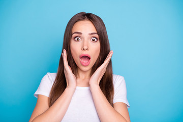 Close-up portrait of her she nice-looking attractive afraid worried feminine straight-haired lady opened mouth scary news isolated over bright vivid shine blue green teal turquoise background