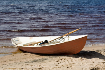 Naklejka na ściany i meble stranded row-boat