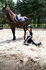 Falling from a horse. A woman with an injury and leg injury.