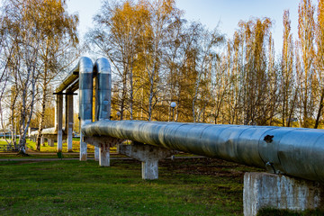 Overhead heating pipes. The pipeline above the ground, conducting heat from the thermal power plant...