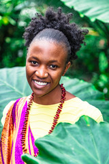 African american beautiful woman posing in jungle