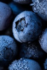Frozen blueberries as background.  Healthy organic fruit. Natural antioxidant. Close up.
