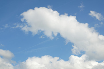 Cloudy sky, cumulus clouds lights in sun rays