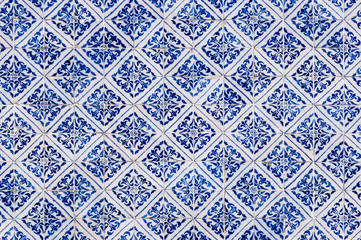 Traditional tiles on the facade of an old house in Porto, Portugal
