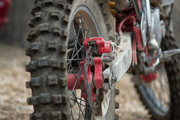 Back view to the wheel of motocross bike.