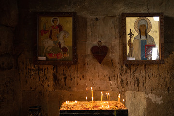 The old Church in the twilight of a Christian cross.