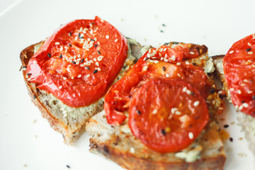 Tasty and healthy.Sandwich with cream cheese and tomatoes for Breakfast.