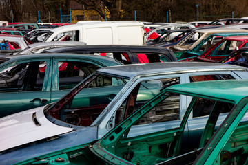 A scrapyard full of car wrecks that were cleared from interior