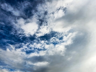 Cloudy skies is bright are beautiful . Bright dramatic Sky at horizon .