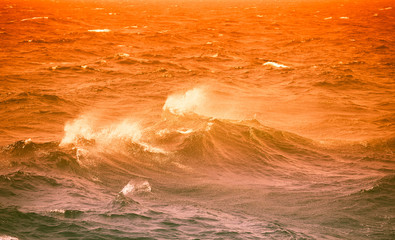 Waves of stormy cold sea on the south of Iceland. Toned