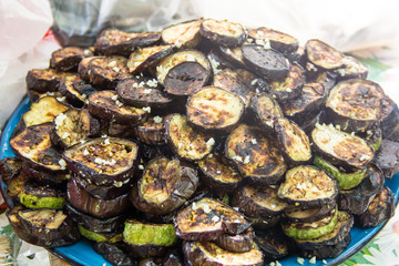 Grilled vegetables including eggplant, zucchini closeup