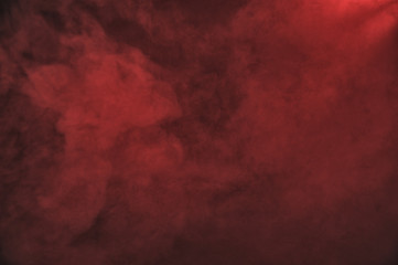 Red smoke on the dark background