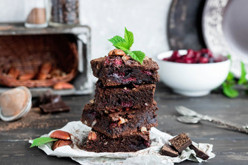 Chocolate brownie with berries and nuts