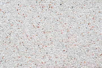 The surface decorated with marble fragments.