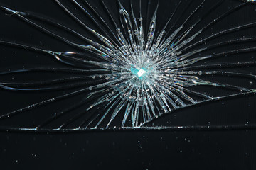 Obraz premium cracked black glass / broken glass abstract texture background