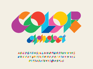 Colorful stylized alphabet design with uppercase, lowercase, numbers and symbols © FotoGraphic