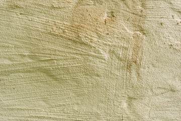 Texture of a concrete wall with cracks and scratches which can be used as a background