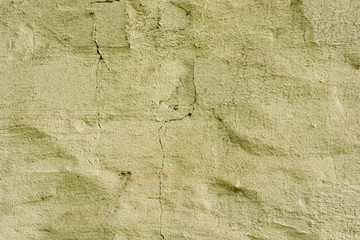 Texture of a concrete wall with cracks and scratches which can be used as a background